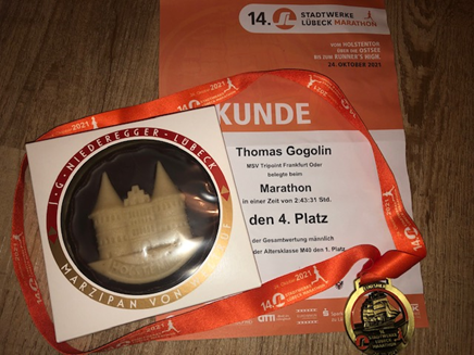 Urkunde & Finishermedaille & Lübecker Marzipan 